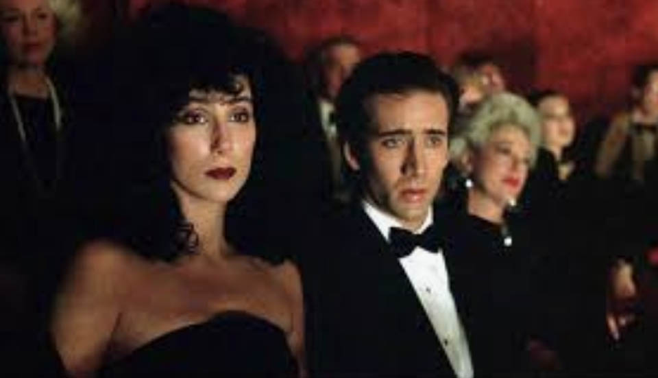 Cher and Nicolas Cage listen to opera. 